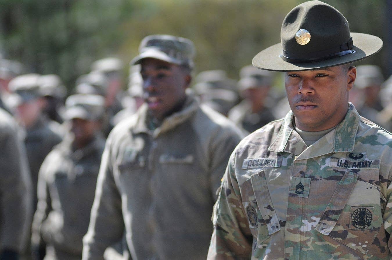Sgt. 1st Class Jonathan Collier, Victor Company, 262nd Quartermaster Battalion, marches QM School troops to the dining facility at lunchtime March 15. He is among the first wave of installation advanced individual training platoon sergeants who attended a U.S. Army Drill Sergeant Academy course.