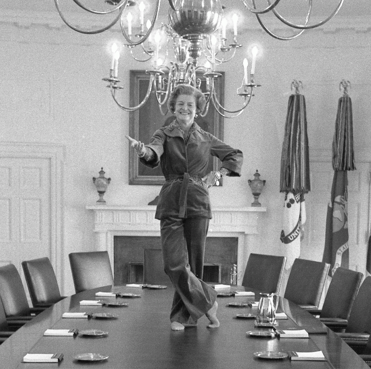 First Lady Betty Ford dances on the Cabinet Room table on the day before departing the White House upon the inauguration of President Jimmy Carter, January 19, 1977.