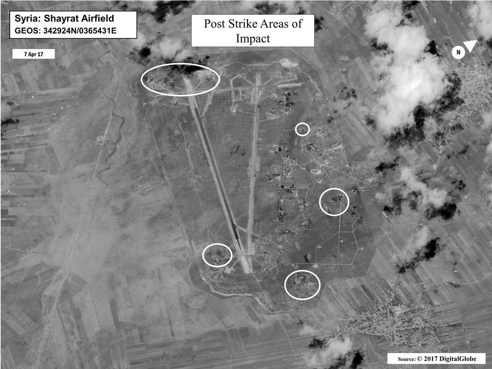 Battle damage assessment image of Shayrat Airfield, Syria, is seen in this DigitalGlobe satellite image, released by the Pentagon following U.S. Tomahawk Land Attack Missile strikes from Arleigh Burke-class guided-missile destroyers, the USS Ross and USS Porter on April 7, 2017.