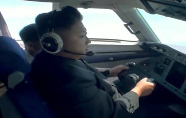 North Korea's state-sponsored news has shown Kim behind the controls of an aircraft.