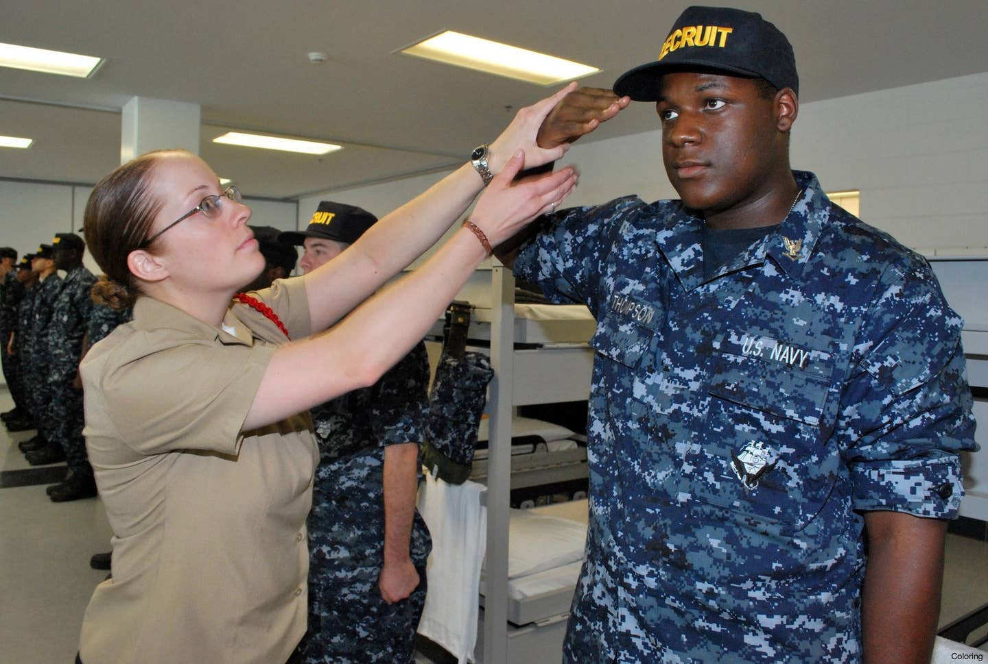 recruits in navy boot camp salute