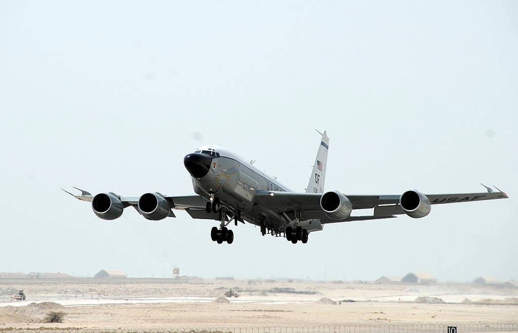 An RC-135V Rivet Joint takes off on mission.