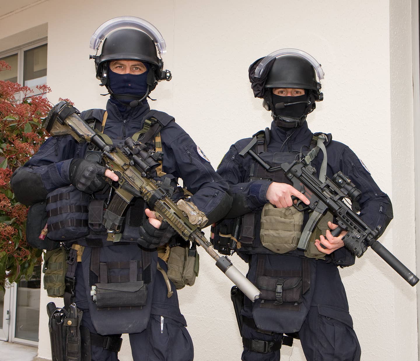 GIGN commandos with rifles and submachine guns