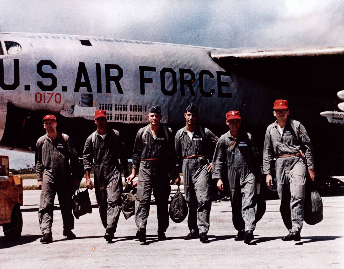 B-52 Stratofortress aircrew depart the flightline after returning from an Operation Arc Light mission over Southeast Asia. Just as in earlier wars, the bombs painted on the fuselage showed the number of missions flown.