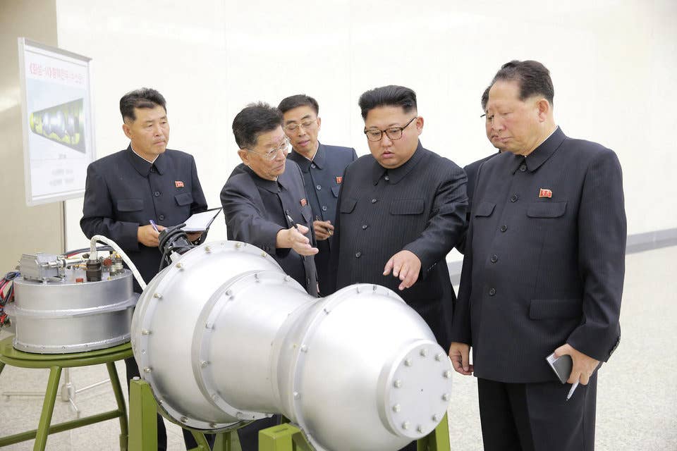 Kim discussing North Korea's nuclear weapons program in an undated photo released by the country's Korean Central News Agency on September 3, 2017.