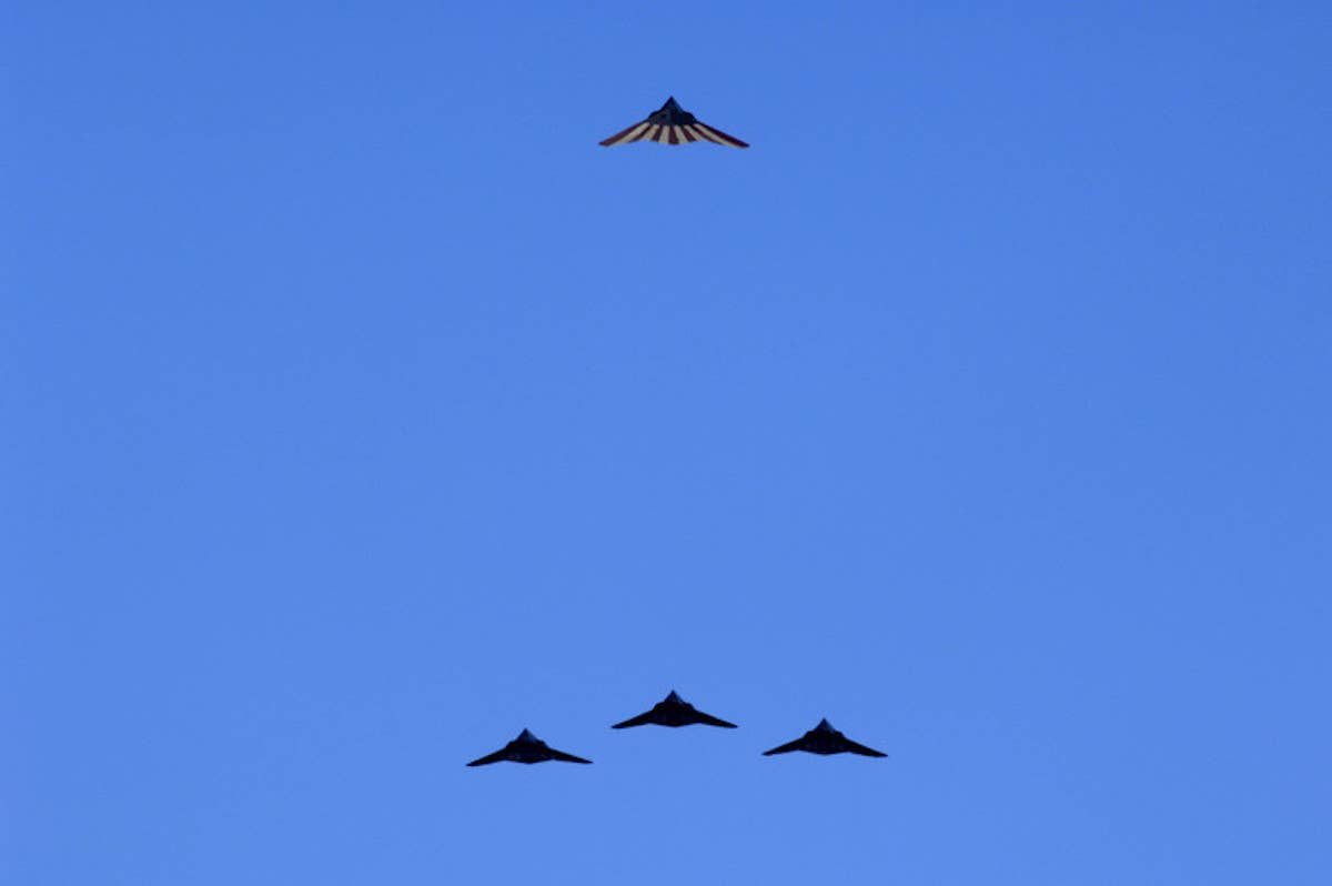 Four F-117A Nighthawksu00a0perform one last flyover at the Sunset Stealth retirement ceremony at Holloman AFB, N.M., April 21, 2008. The F-117A flew under the flag of the 49th Fighter Wing at Holloman Air Force Base from 1992 to its retirement in 2008.