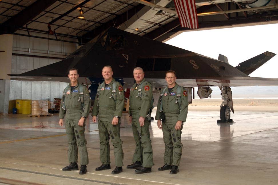 From left: retired Col. Jack Forsythe, Lt. Col. Mark Dinkard, 49th Operations Group deputy, Lt. Col. Todd Flesch, 8th Fighter Squadron commander, Lt. Col. Ken Tatum, 9th Fighter Squadron commander, after retiring the last four F-117s to Tonopah Air Force Base, Nevada April 22, 2008.