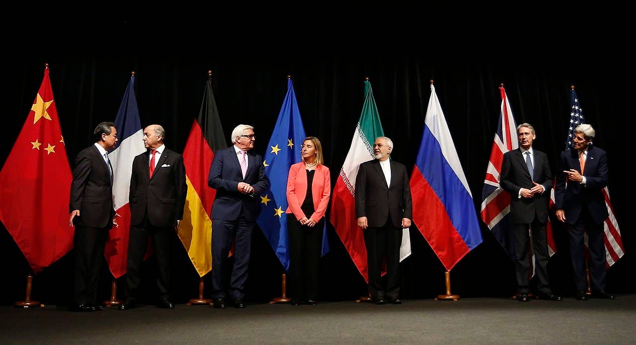 Iran nuclear deal: agreement in Vienna. From left to right: Foreign ministers/secretaries of state Wang Yi (China), Laurent Fabius (France), Frank-Walter Steinmeier (Germany), Federica Mogherini (EU), Mohammad Javad Zarif (Iran), Philip Hammond (UK), John Kerry (USA).