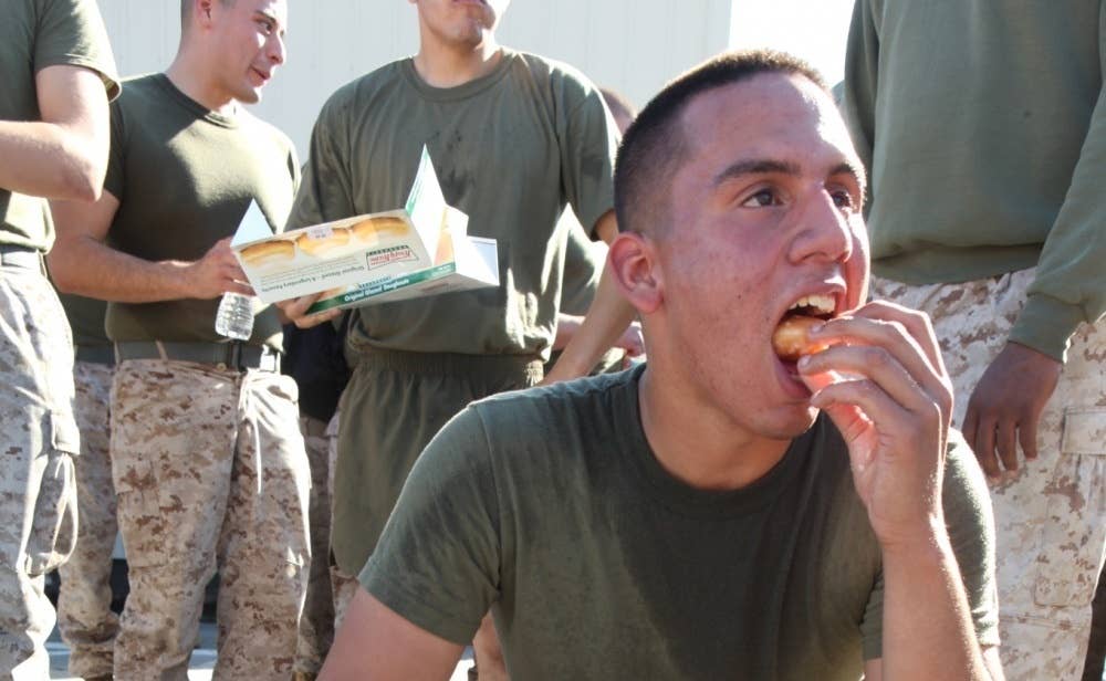 Doughnuts and coffee are also a cheap and efficient morale boosters.<br>(Photo by Lance Cpl. Paul Peterson)