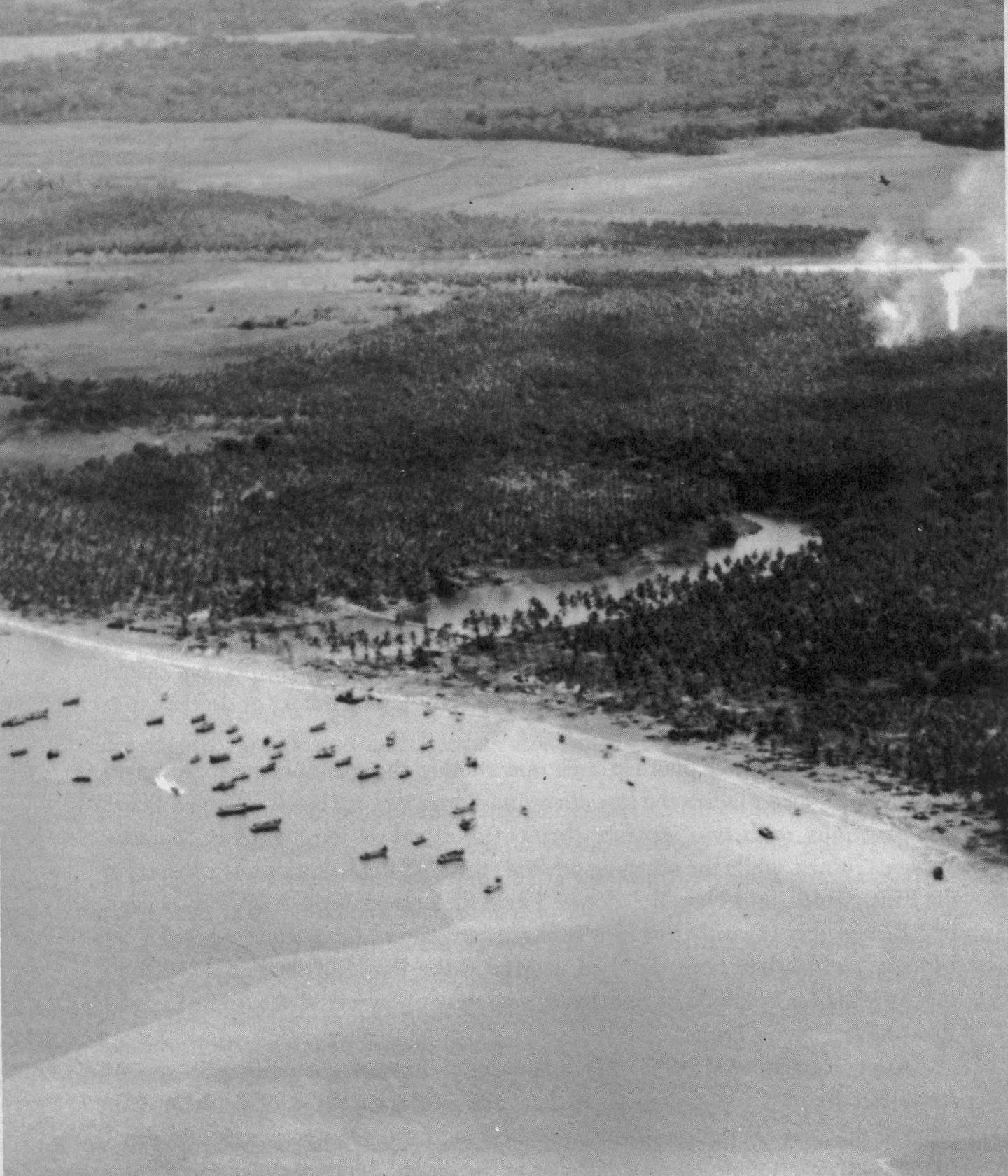 An aerial view of Lunga Point, Guadalcanal, during World War II showing the airfield captured by the U.S. Marines early in the campaign.