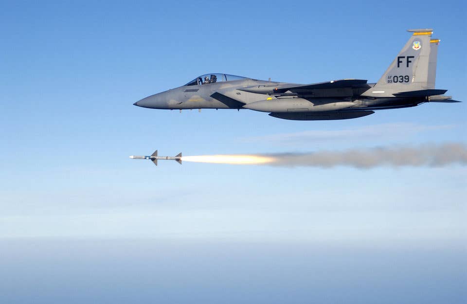 First Lt. Charles Schuck fires an AIM-7 Sparrow medium range air-to-air missile from an F-15 Eagle here while supporting a Combat Archer air-to-air weapons system evaluation program mission.