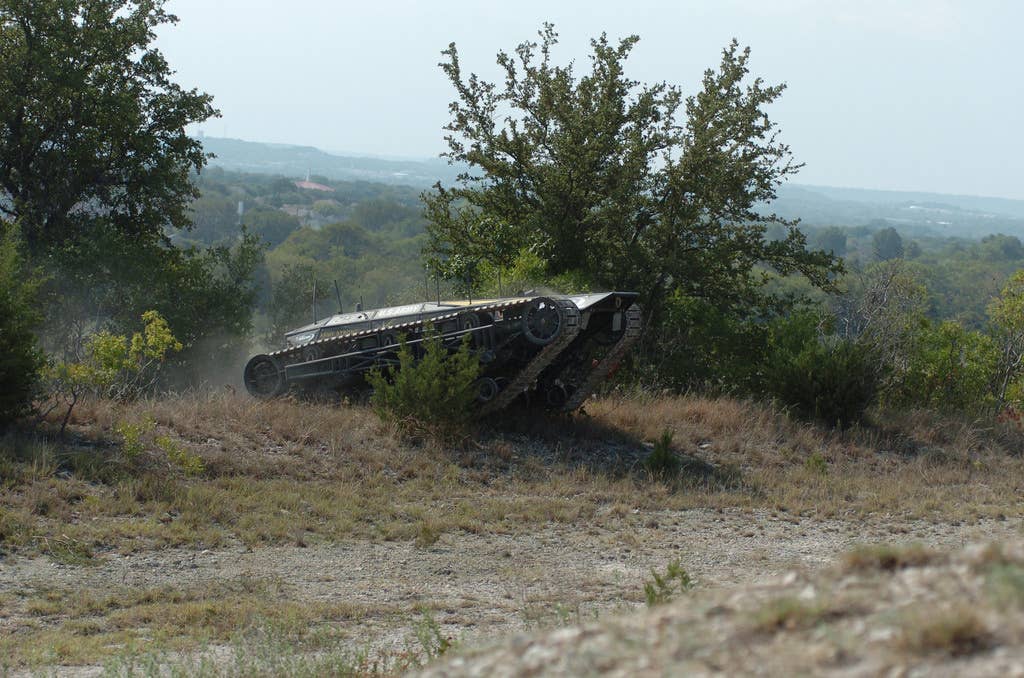 The RIPSAW-MS1 demonstrates its off-road capabilities during a lanes exercise at the Fort Hood Robotics Rodeo. The RIPSAW is equipped with six claymore mines, can carry 5,000 pounds and tow multiple military vehicles. The RIPSAW is designed to be an unmanned convoy security vehicle.