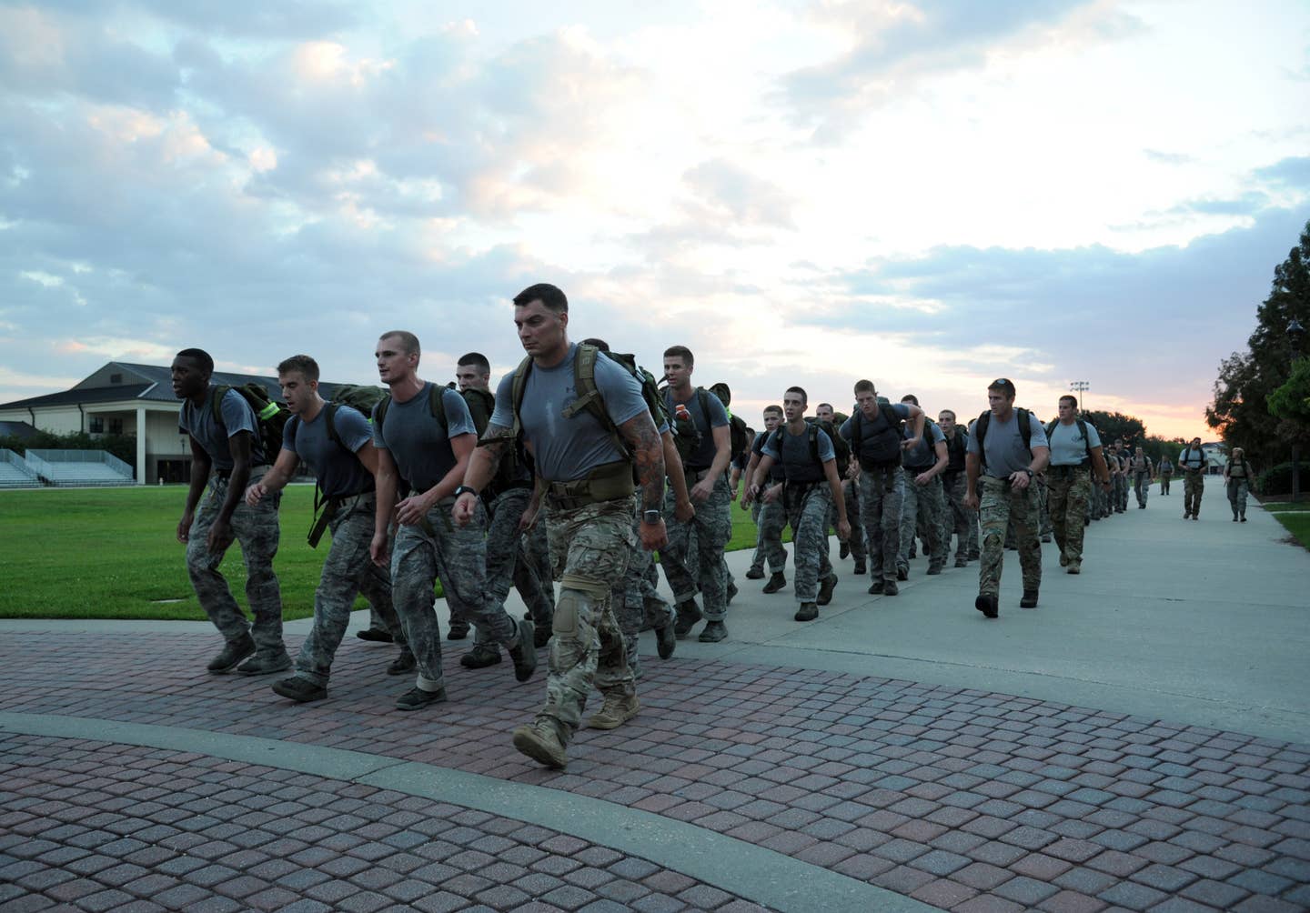 Members of the 334th Training Squadron combat controllers and the 335th Training Squadron special operations weather team begin a physical training session bright and early