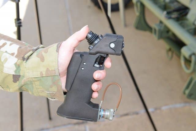 This small joy stick device has been designed to control one of the four vehicles that the Army is considering to fill the role of the Squad Multi-Purpose Equipment Transport.
