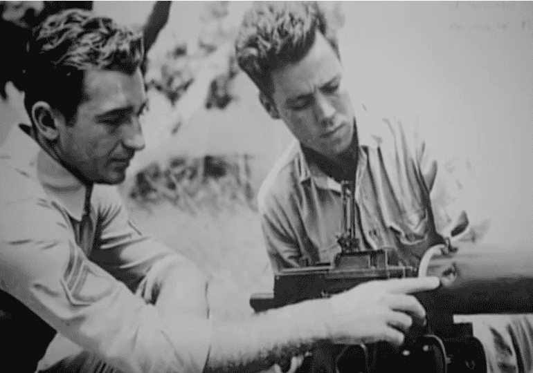 Sgt. Mitchell Paige as he inspects one of his Marine's machine gun. (Medal of Honor Book)