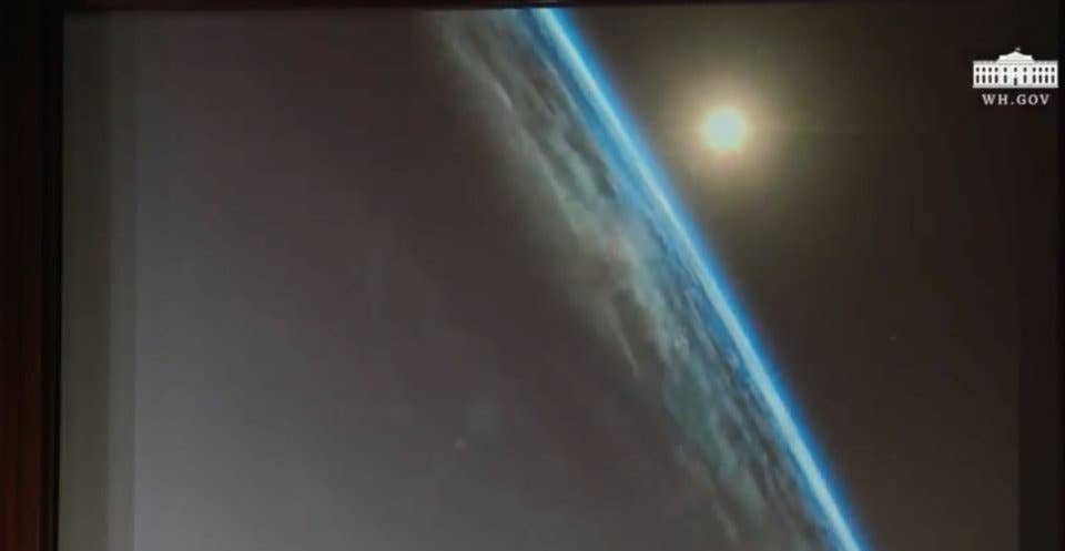 A shot of the sun rising over the earth, included as part of the video.