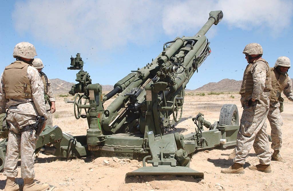 US Marine gunners test fire an M777 howitzer.