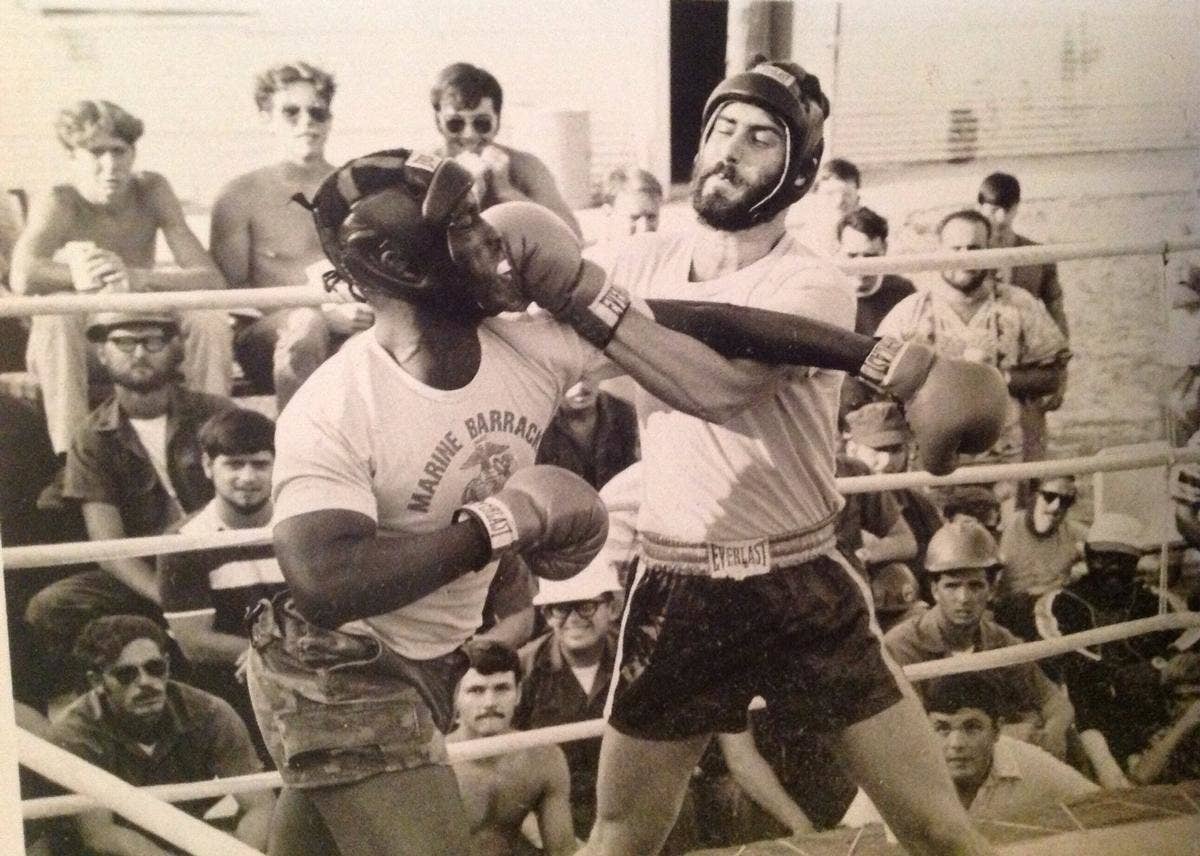 Light Heavyweight match between Navy sailor Dale Alexander (right) and his Marine opponent.