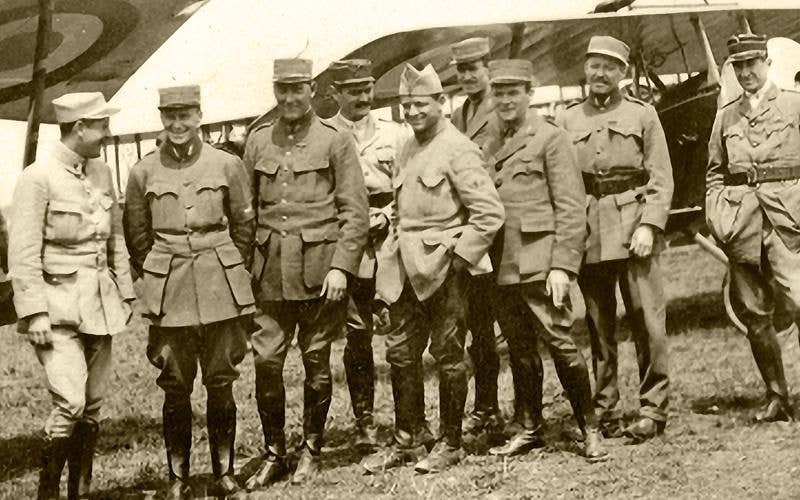 Members of the Lafayette Escadrille pose in front of their Nieuport fighters at the airfield in Verdun, France circa 1917.