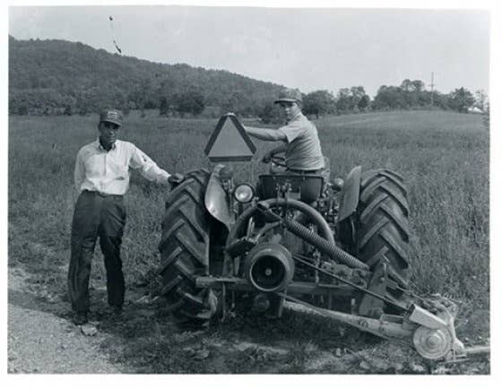 Army veteran Garlin Conner (left) retreated to working on a tobacco farm following his military service in World War II.