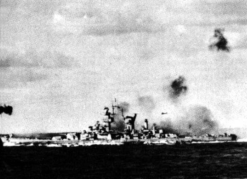 The large cruiser USS Alaska (CB 1) fighting off a Japanese air attack.<br>(US Navy photo)