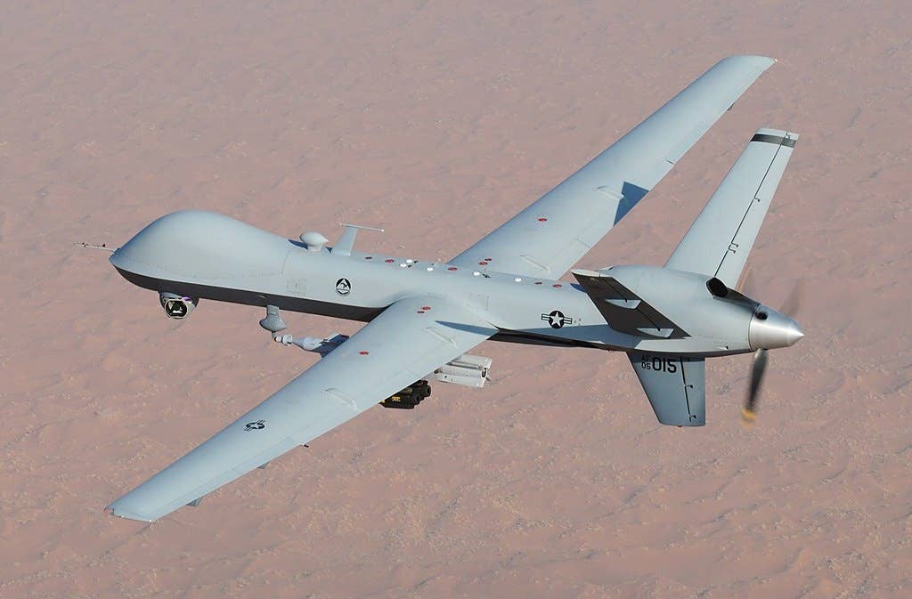An MQ-9 Reaper unmanned aerial vehicle flies a combat mission over southern Afghanistan.