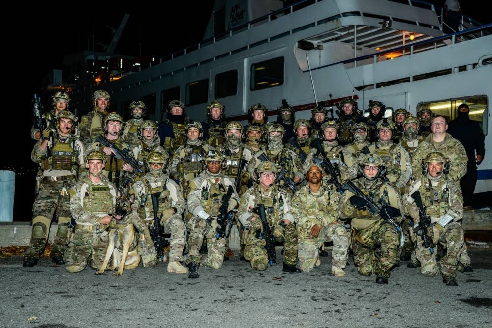 Members of the Maritime Security and Response Team during 2015 nighttime training operations.