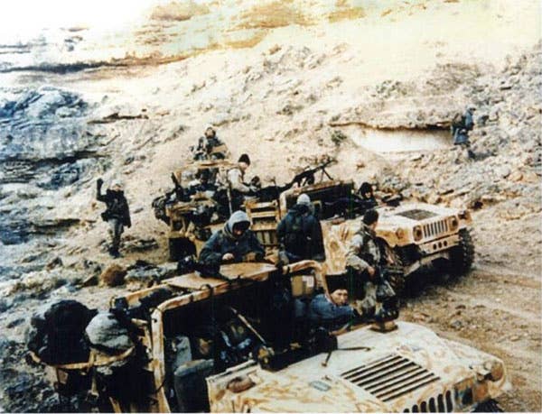 delta force special missions unit in tanks on terrain in Iraq
