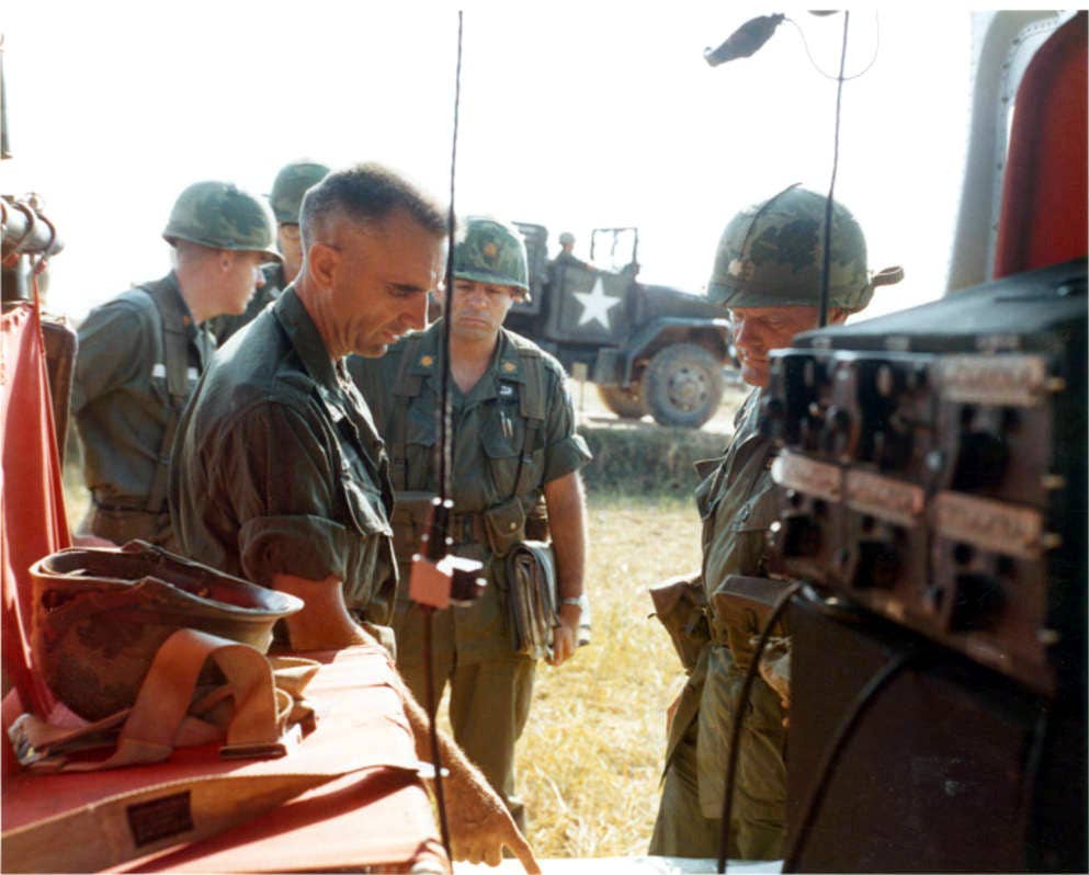 A senior officer is briefed on the progress of Operation Harrison by a commander in the field.

(US Army)