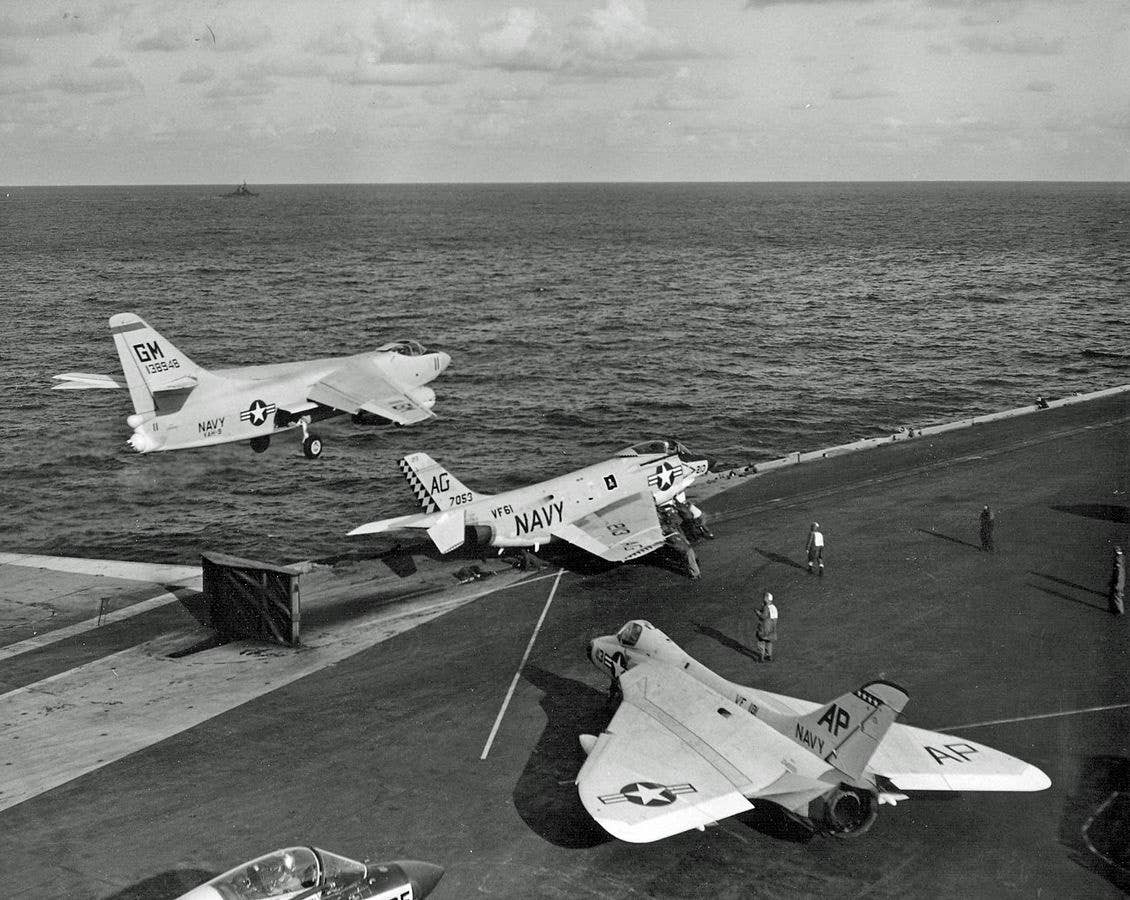 Navy aircraft take off after during operations in 1957. (U.S. Navy)