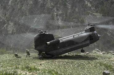 A CH-47 deposits troops while carrying out a pinnacle landing during the Battle of Tora Bora.<br>(Department of Defense)