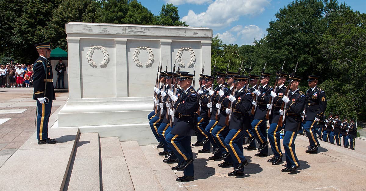 U.S. Army soldiers from the 3rd Infantry Regiment "Old Guard" march up to the Tomb of the Unknown Soldier for a wreath laying ceremony in commemoration of the Army's 238th Birthday in Arlington National Cemetery, Va., on June 14, 2013.<br>(DoD photo by Staff Sgt. Teddy Wade)