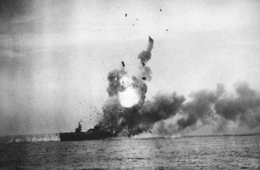 A German plane crashes into the carrier USS St. Lo