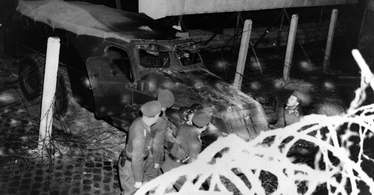 A communist soldier made a daring escape through the Berlin Wall in an APC