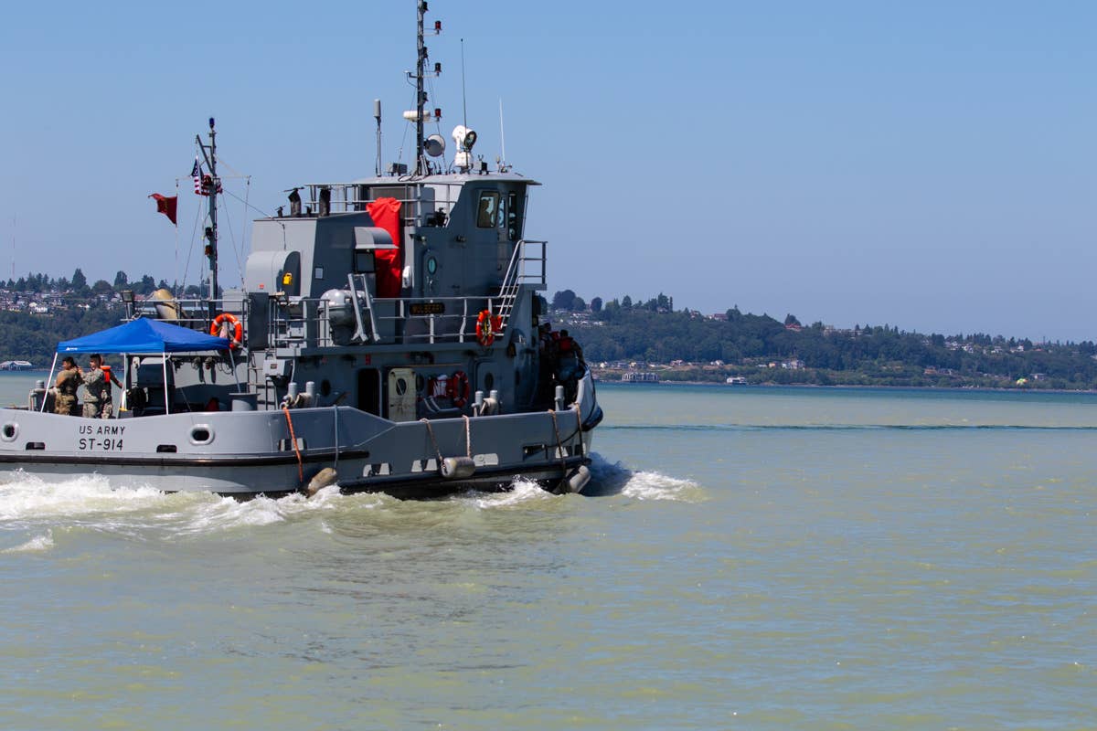 That's an Army tug, one of the service's smaller watercraft. Larger vessels are big enough to carry multiple tanks and trucks at once.<br>(U.S. Army photo by Sgt. Thomas Belton)