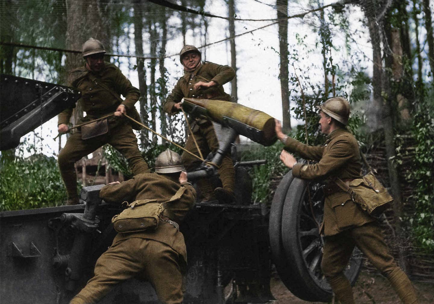 Colorized photo of French artillerymen during the defense of France in 1940 as the German blitzkrieg thunders towards Paris.<br>(Cassowary Colorizations)