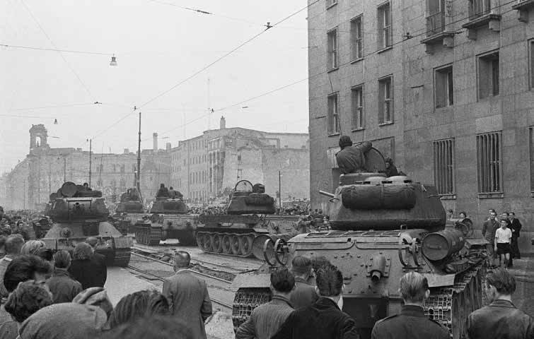 Soviet tanks disperse protesters in the Soviet Sector of Berlin in 1953. Blending into Cold War Berlin was a must as Soviet forces outnumbered those of the former Allied forces by a massive amount, necessitating that elite operators blend in to the local populace in order to gather intelligence and prepare for combat operations.<br>(U.S. Army)