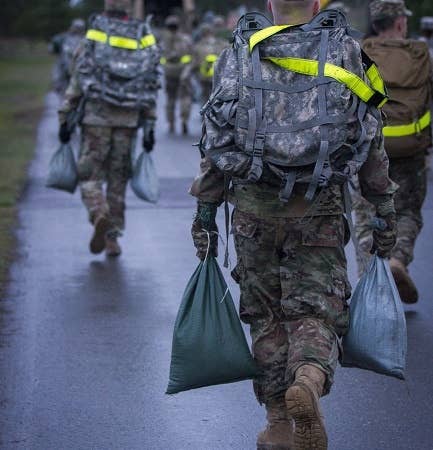 "Oh, wow! Your feet are hurting on this ruck march? No way! You're literally the only person that that has ever happened to!" (U.S. Army photos by Pvt. Adeline Witherspoon)