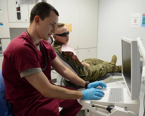 "Can you schedule that wisdom tooth removal for the 17th? We're going to the field soon." (<a href="https://www.airforce.com/" target="_blank" rel="noreferrer noopener">U.S. Air Force</a> photo by Staff Sgt. Teresa J. Cleveland)