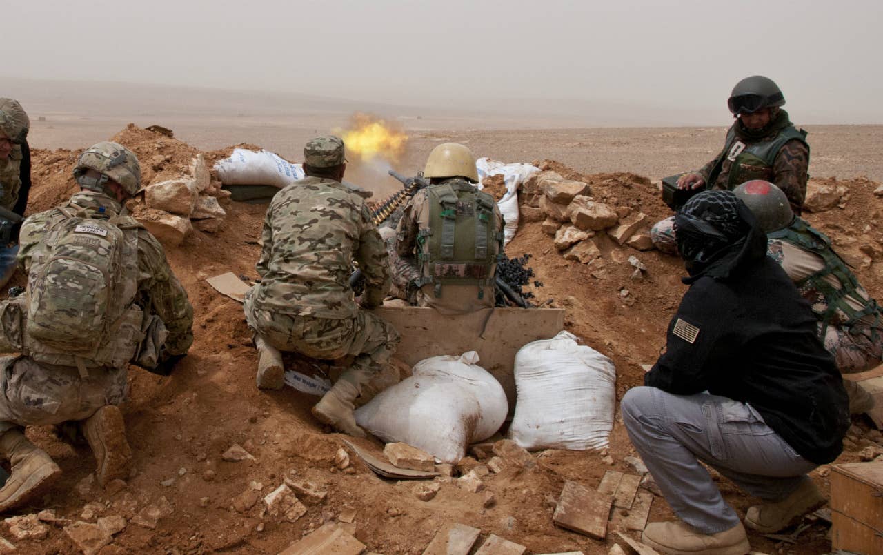 A Jordanian soldier fires the M2 .50-cal. machine gun during an exercise near Amman, Jordan in 2018. (U.S. Army)