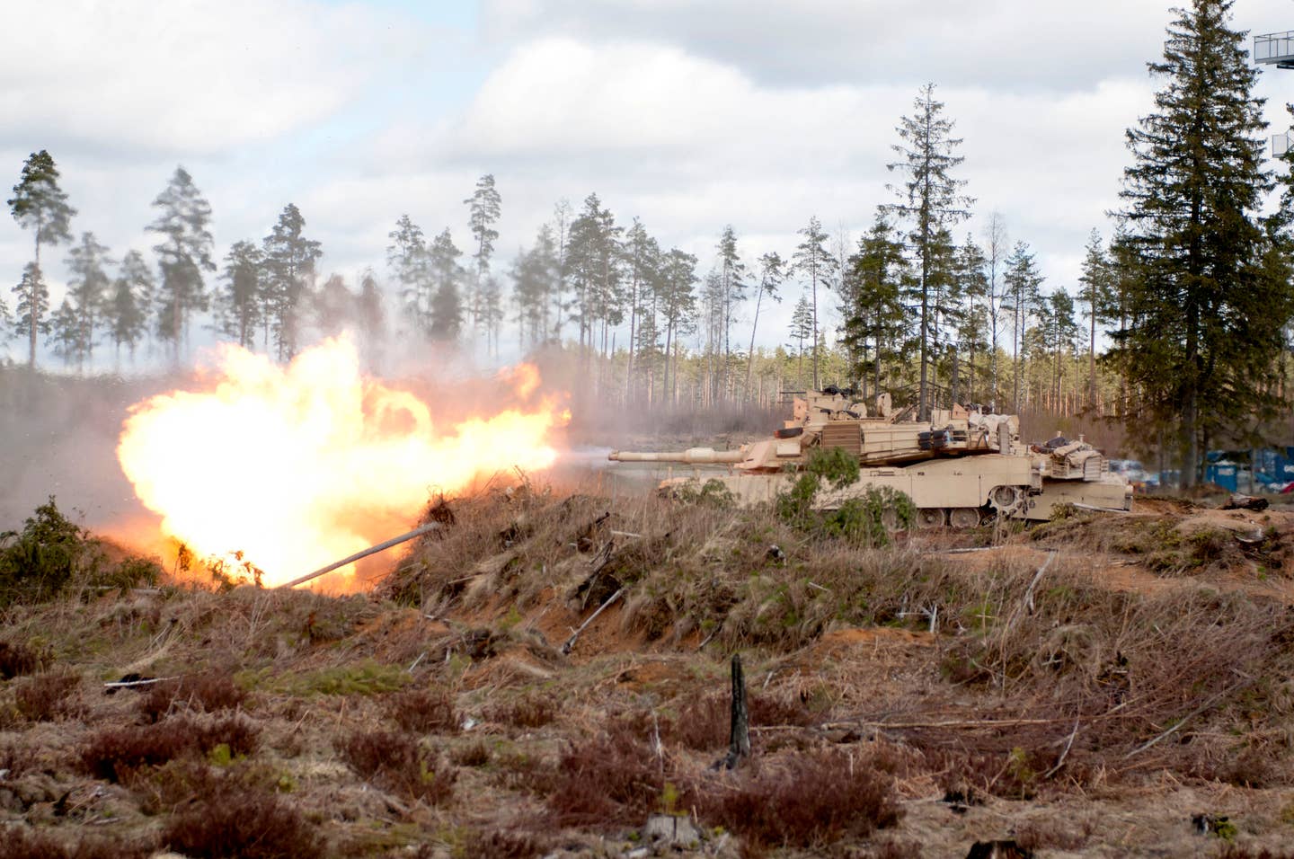 A U.S. M1A2 Abrams tank fires during a 2015 exercise in Estonia.<br>(U.S. Army Sgt. Juana M. Nesbitt)