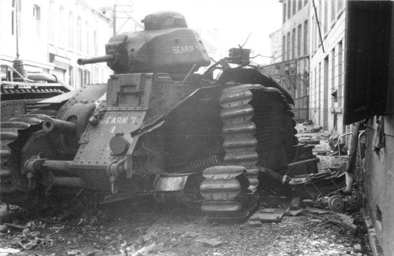 A French Char B1 tank destroyed by its crew. The Char B1 was a good tank with thick armor, a strong 75mm gun, and acceptable speed. But French armor was not used effectively in the defense of France despite France having about as many tanks as Germany did.<br>(Bundesarchiv Bild)