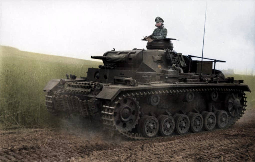 A German Panzer III lacked the gun needed to penetrate the armor of the Char B1.<br>(Unknown photographer, edited by Cassowary Colorizations)