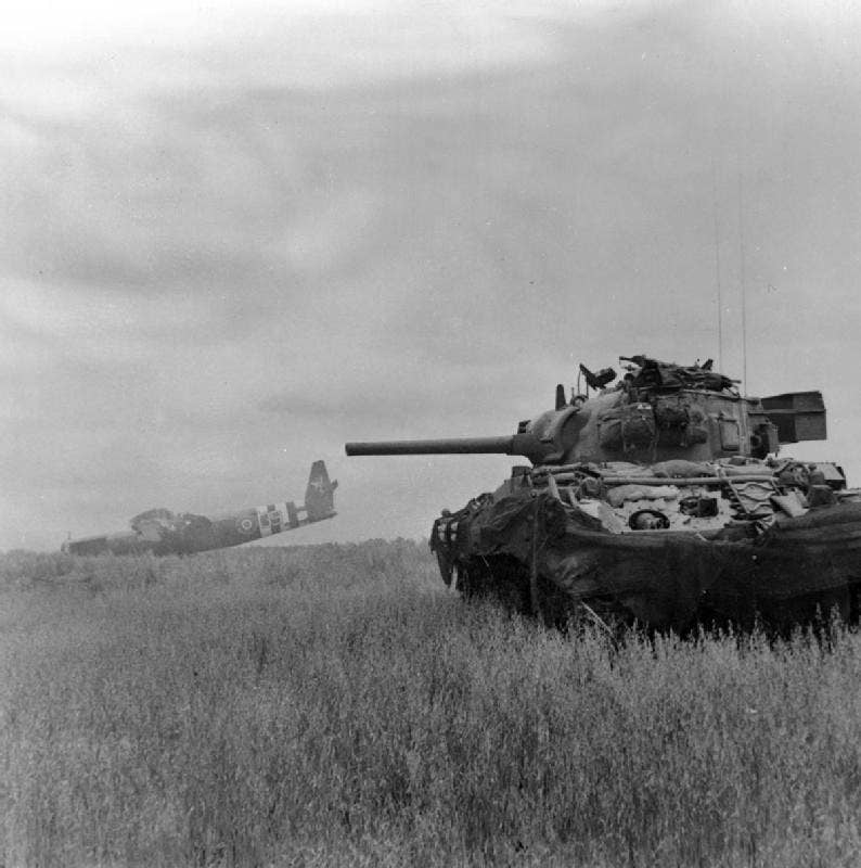 A Sherman tank in action against German troops in 1944. The Sherman was a mainstay of World War II, but was outdated by the 1965 when India drove them into combat against Pakistan. (Sgt. Christie, No. 5 Army Film and Photographic Unit)