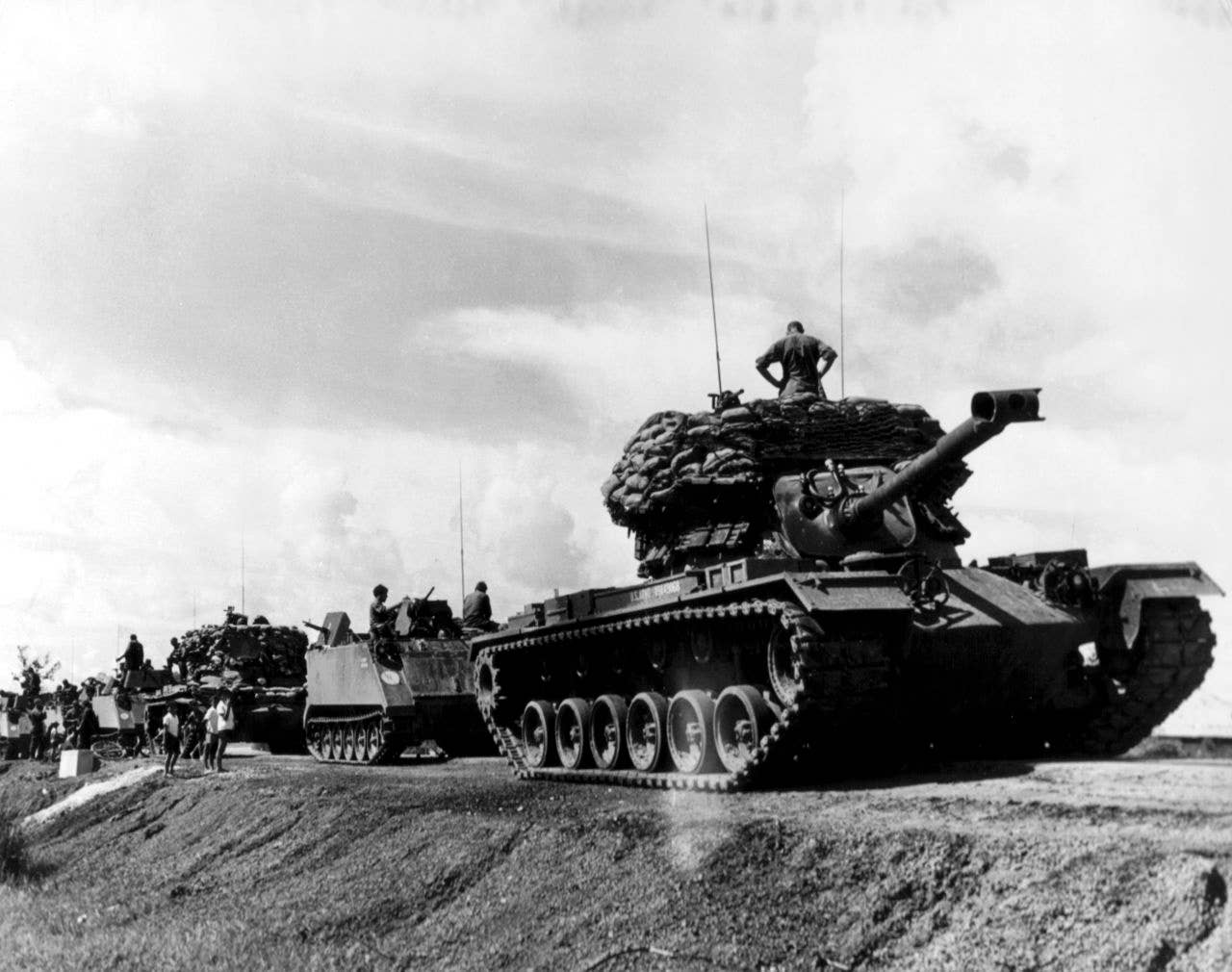 M48 Pattons were advanced and capable tanks during the Cold War. The M48s in this column in Vietnam were fitted with sandbags on the turrets to turn them into mobile pillboxes. (U.S. Army)