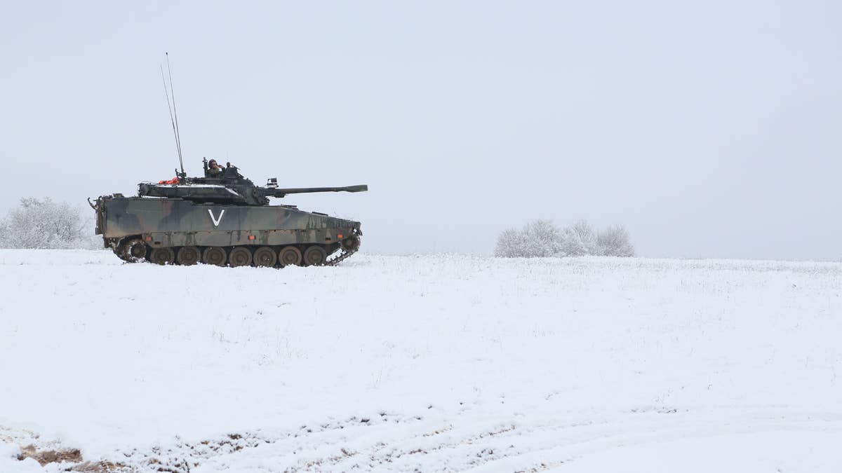 A Dutch Army Centurion Tank provides security while conducting a scouting exercise in Hohenfels, Germany, January 26, 2015.<br>(U.S. Army Spc. Tyler Kingsbury)