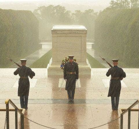 Soldiers of the 3rd Infantry Regiment continue to stand guard at the Tomb of the Unknown Soldier, despite the worsening weather conditions surrounding Hurricane Sandy.<br>(U.S. Army)
