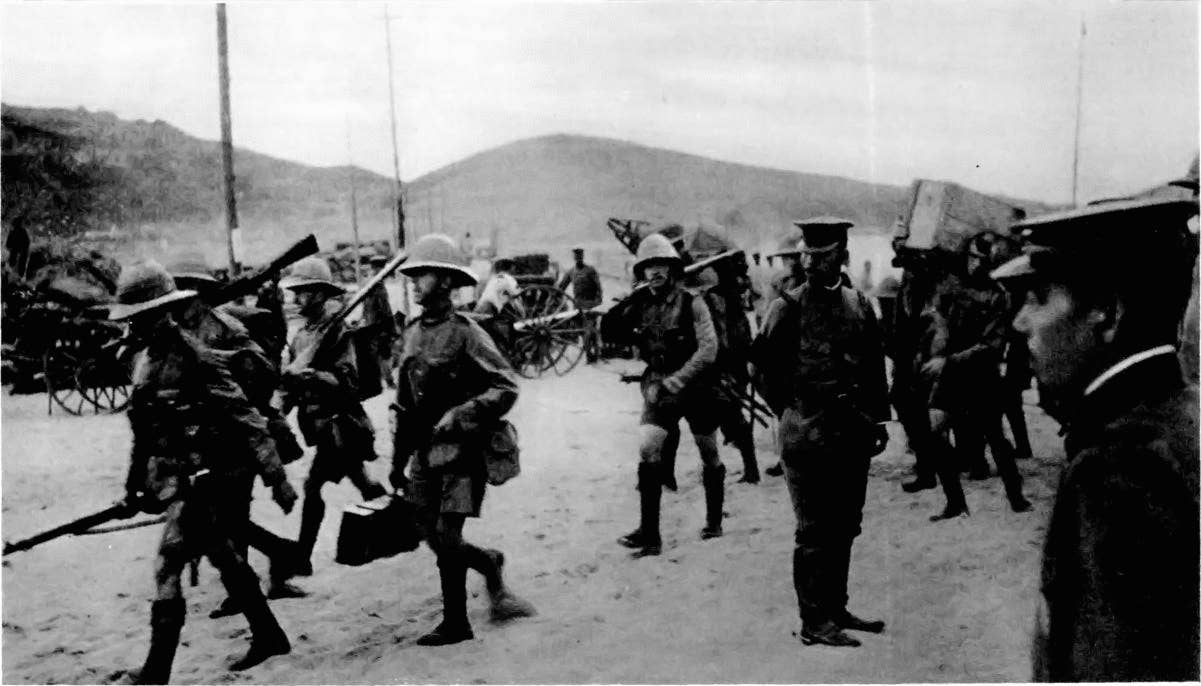 British troops march into Tsingtao after capturing it from German troops in 1914.​<br>(British Government)