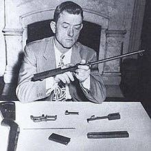 David Marshall "Carbine" Williams with his contribution to World War II. (Wikimedia Commons)