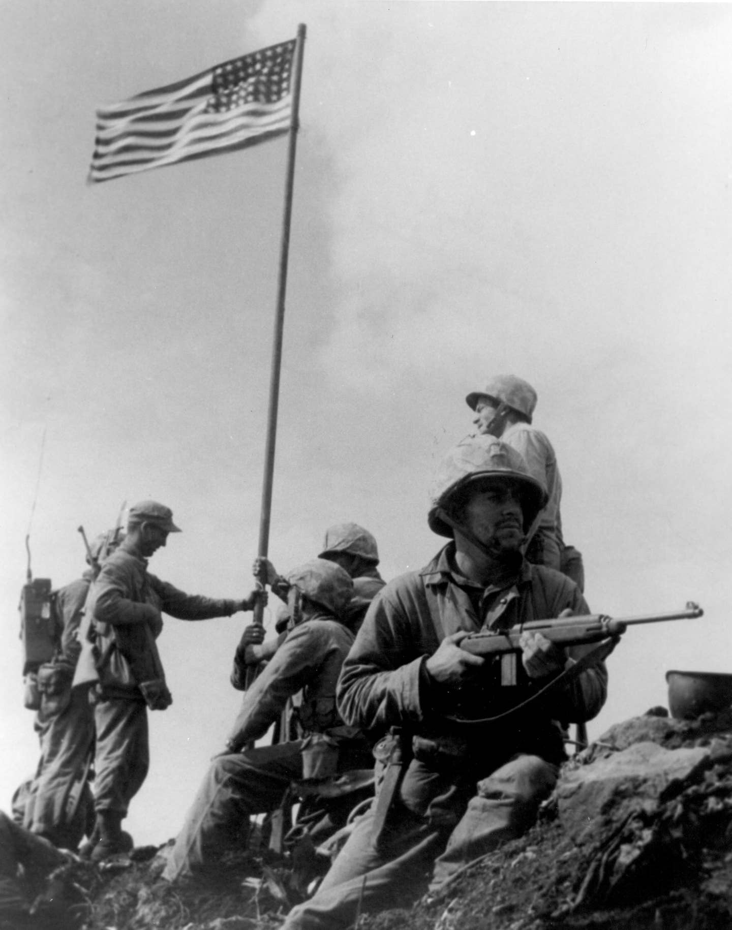 M1 Carbines were present at the first Iwo Jima flag raising. (USMC photo by Staff Sergeant Louis R. Lowery)